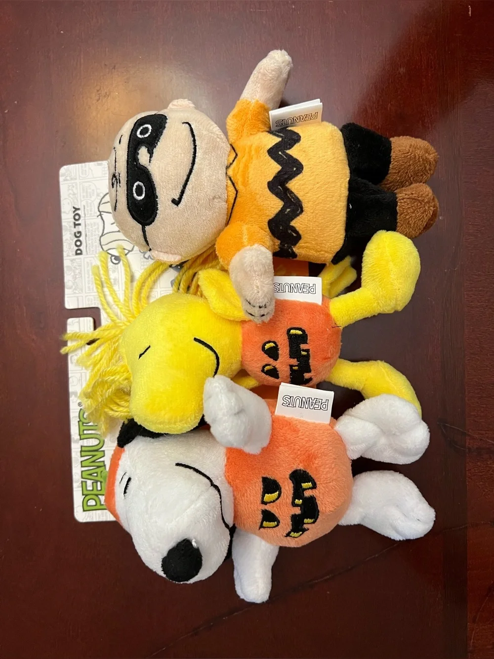Peanuts Plush Trio in Orange, Yellow, White & Black